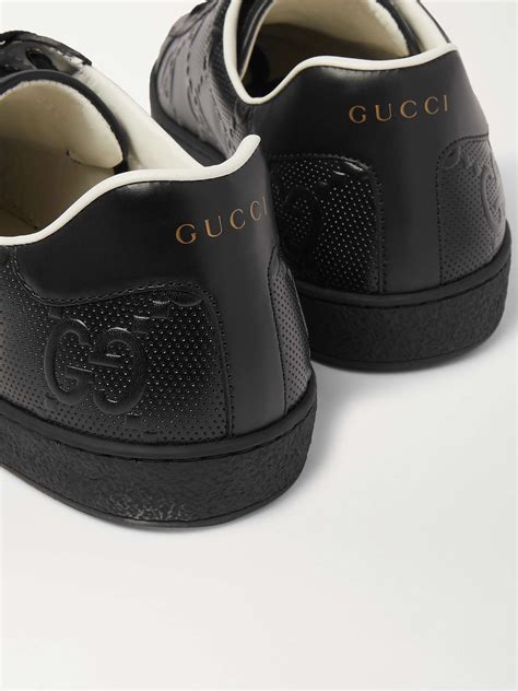 gucci perforated logo sneakers|classic gucci sneakers for men.